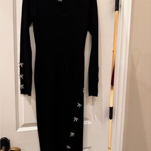Elegant Knit Stretch Black Dress with Rhinestone Bow Accents